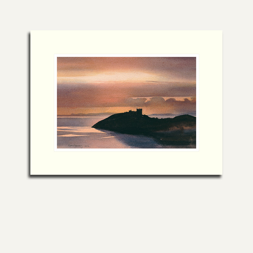 Mounted Cricieth castle at sunset.